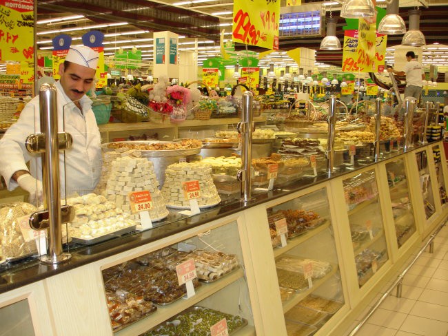 The chef with delicious arabic sweets...of course I bought some :)