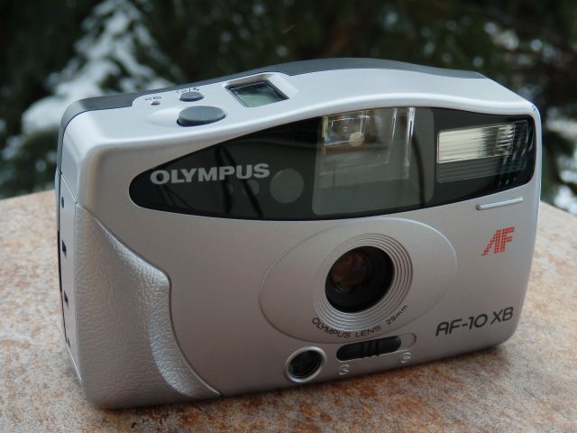 Olympus AF-10XB) (1999)