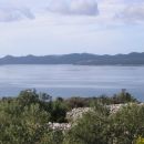 Pogled s Kozjaka na Ravu i Dugi otok